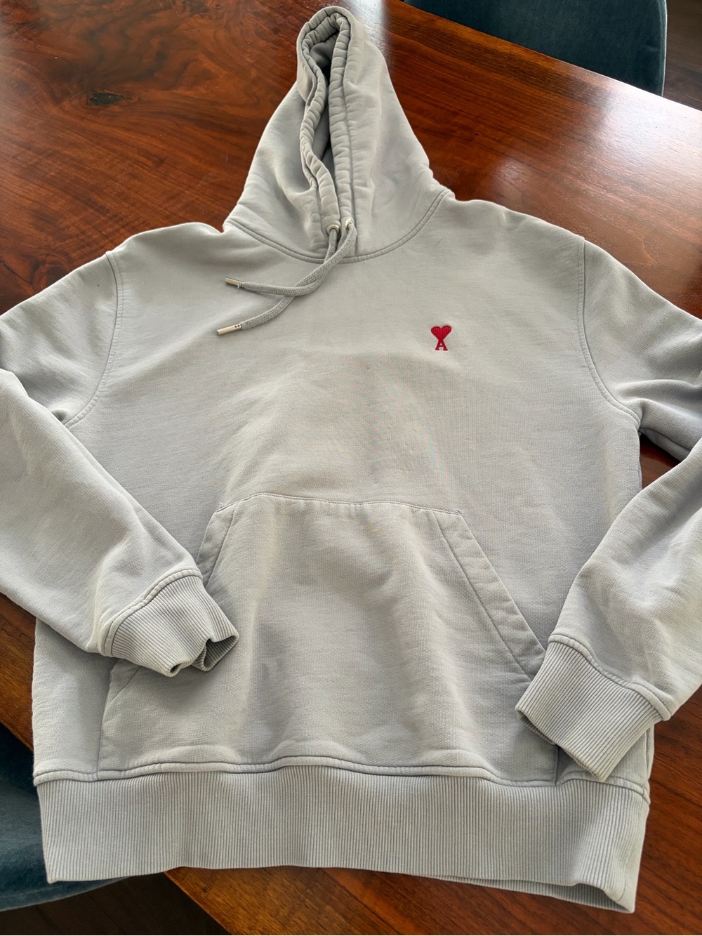 Ami Men's Light blue hoodie. Small rip as pictured by front pocket.